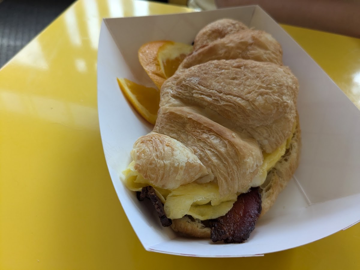 A warm breakfast croissant served at Passion Pie Cafe